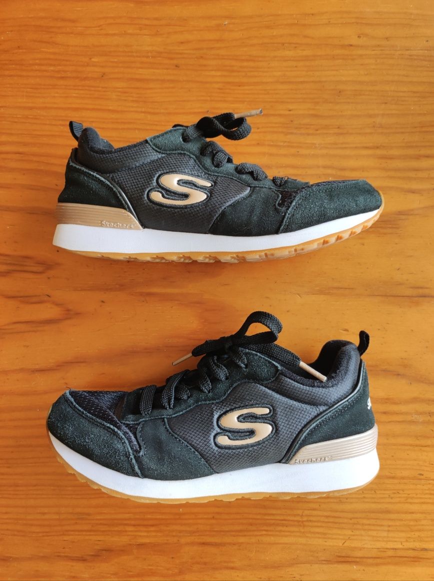 Skechers pretas e clearance douradas