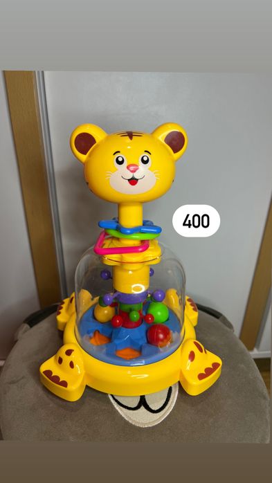 Музичні іграшки, сонний жираф, дзиґа, в чудовому стані
