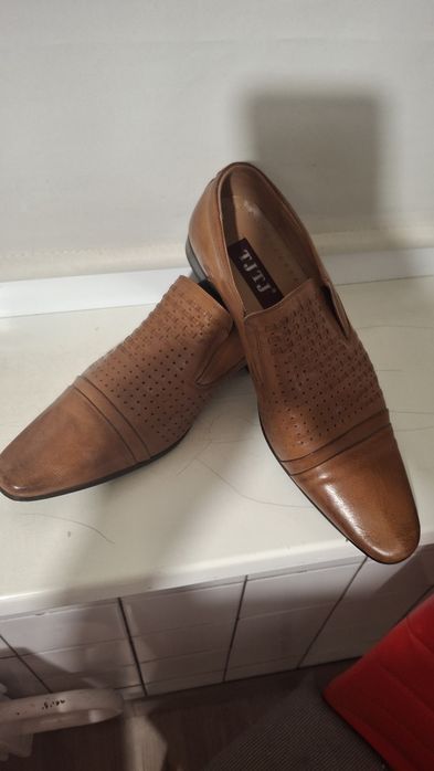 Продам кожанные туфли