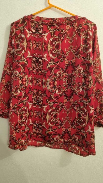 Blusa  muito confortável, como nova