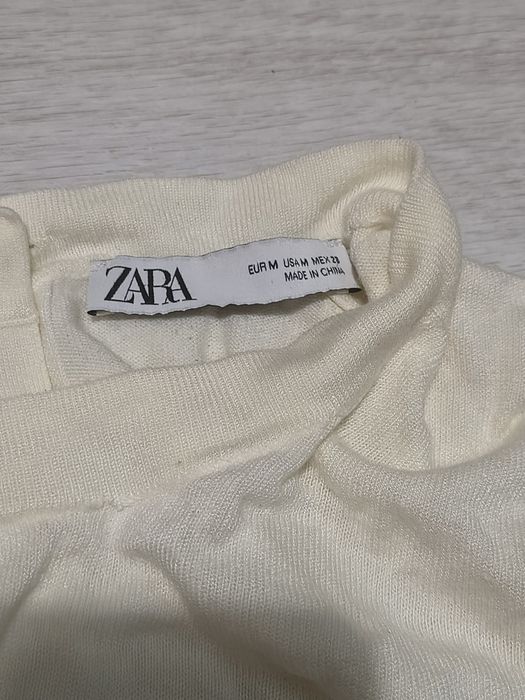 Beżowy sweter sweterek ze średnim rękawem