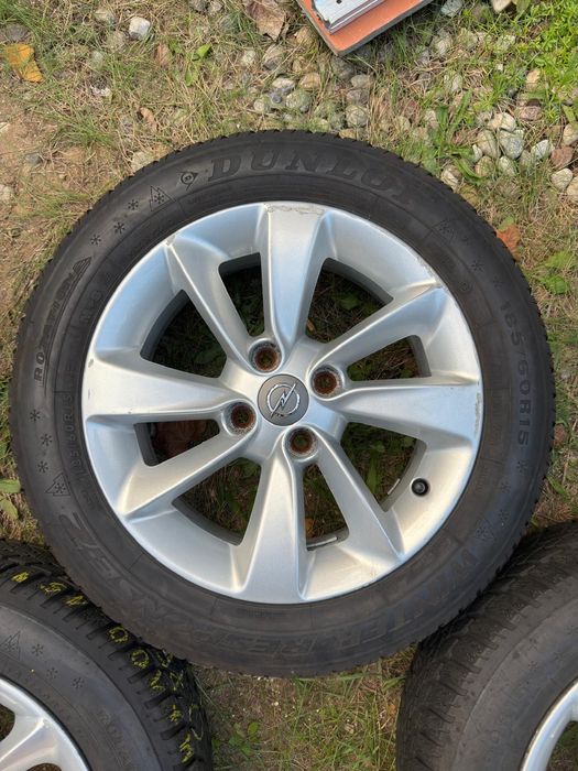 Sprzedam komplet 4 oryginalnych aluminiowych kół Opel 15" wraz z oponami zimowymi Dunlop Winter Response 2.