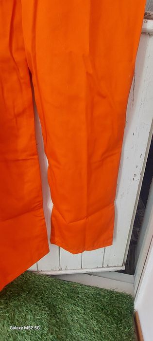 Комбинезон рабочий . Оранжевй .