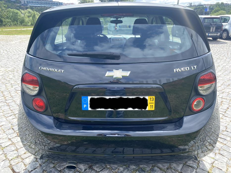 Carro citadino - Chevrolet Aveo LT Bi-Fuel 2013