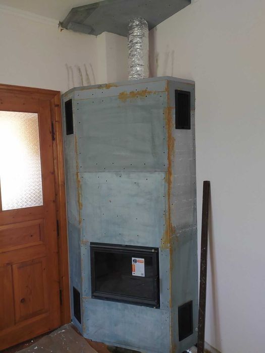 Якісний монтаж каміна з обігрівом на будинок