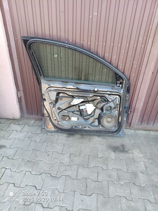 " Passat B6 drzwi lewe przednie LC9X