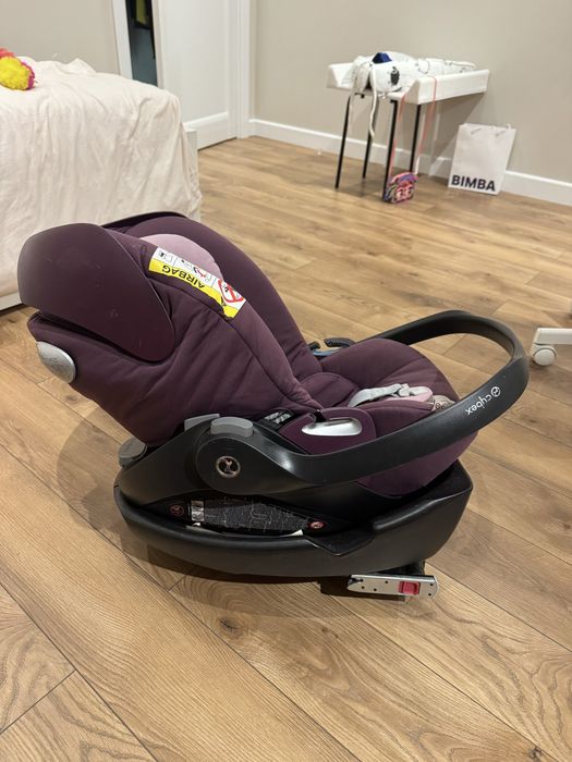 Фіолетове/рожеве Автокрісло дитяче Cybex Cloud разом з базою Isofix + перехідники на шасі для Bugaboo