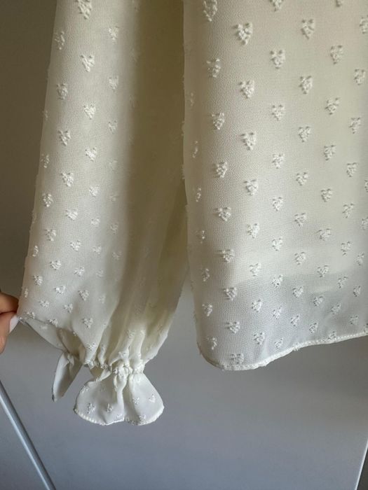 Blusa creme plumeti da H&M