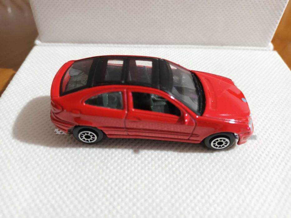 Miniaturas 1/64 Welly CM