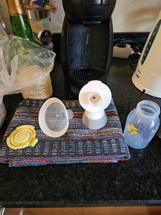 Bomba de tirar leite e camara de quarto