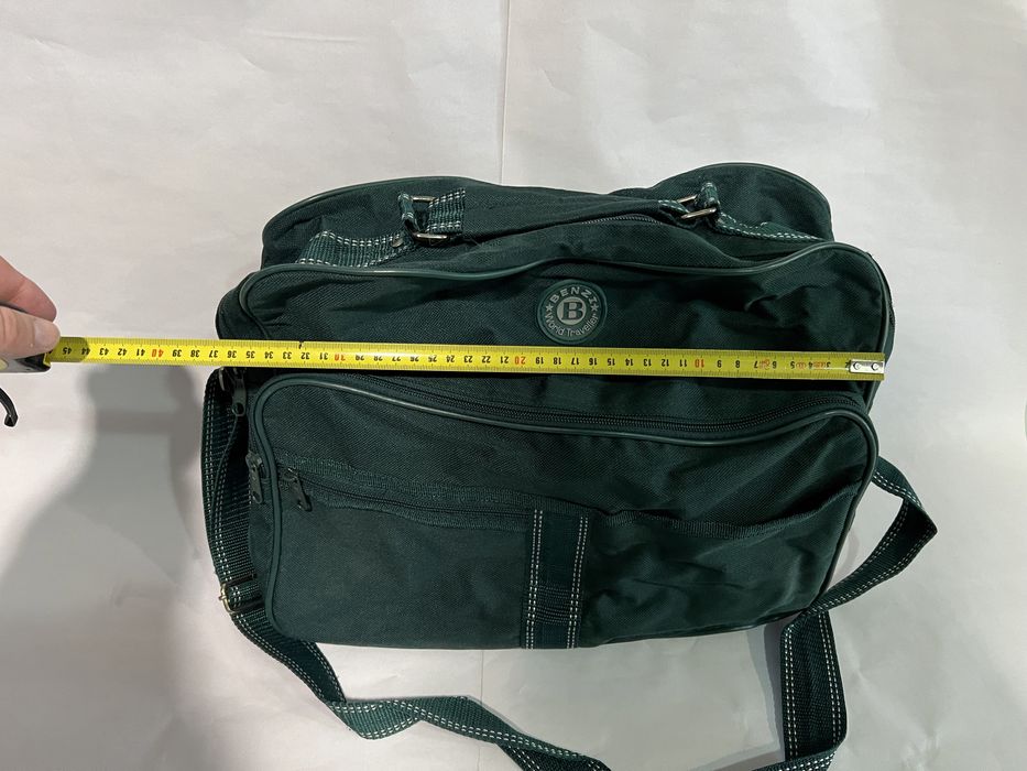 Saco de transporte verde com tira colo