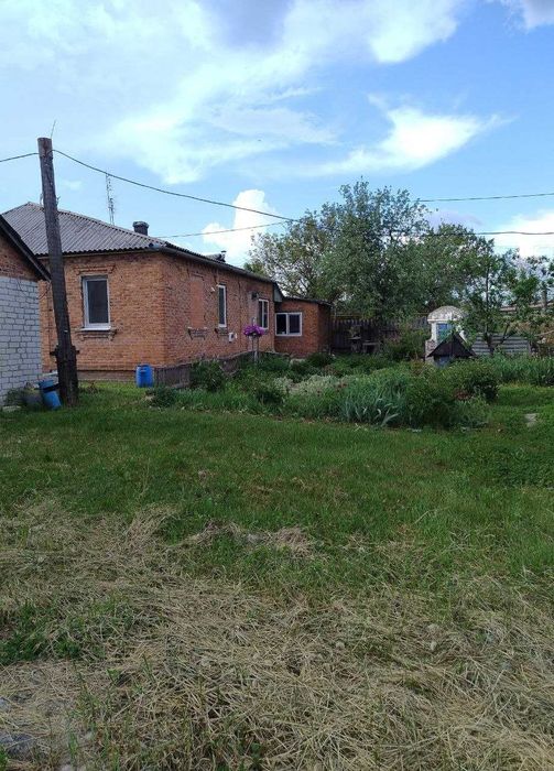 Продам кирпичный дом 108м2, земельный участок 25 соток г.Мерефа SM