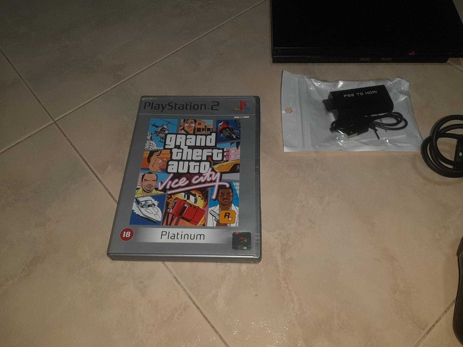 PS2 com 1 comando e 1 jogo GTA