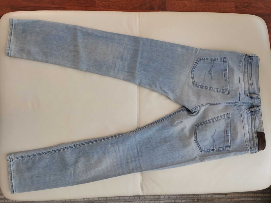 DIESEL spodnie jeansowe Model BELTHER  rozm. W 32 L 34 używane