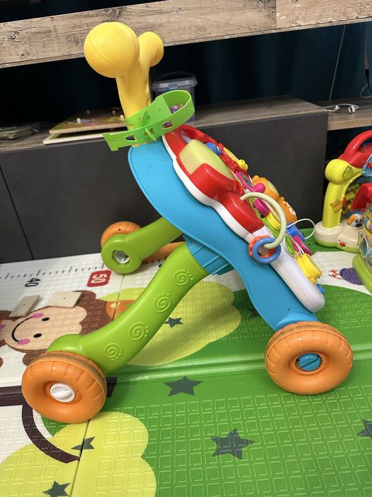 Дитяча каталка ходунки