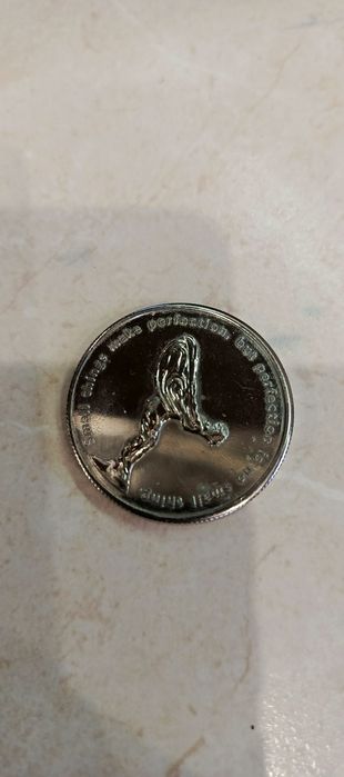 Монета Rolls Roys