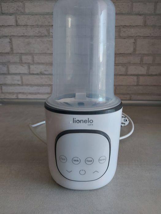 Підігрівач і стелізатор пляшечок