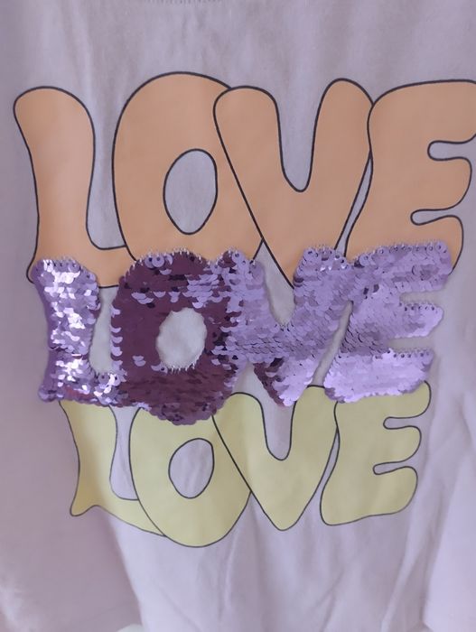 Bawełniany t-shirt dziewczęcy z cekinami 110/116