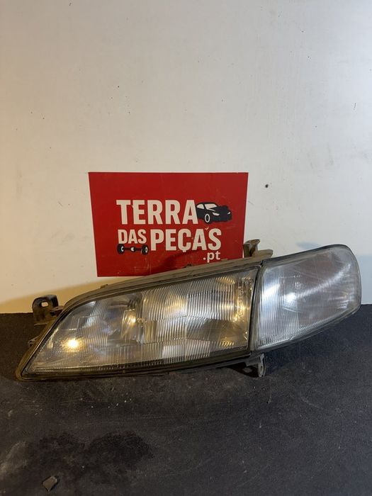 Farol Frontal Opel Vectra B Esquerdo 54532889 com pisca