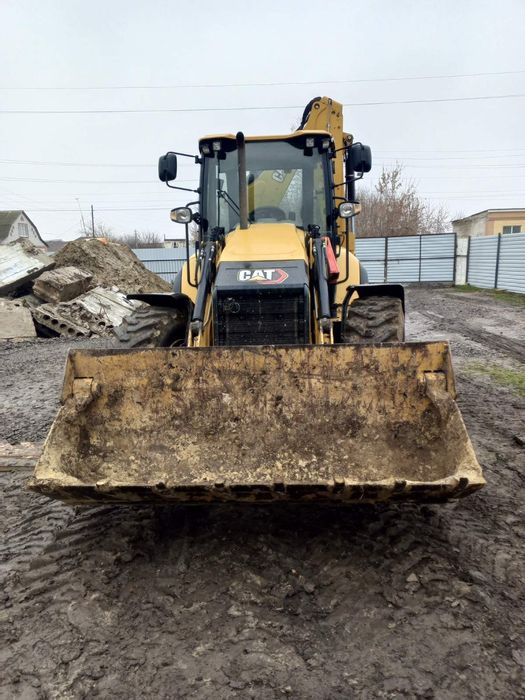 Екскаватор навантажувач  CAT-434