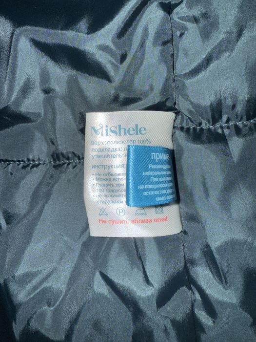 Шикарна подовжена куртка з натуральним хутром