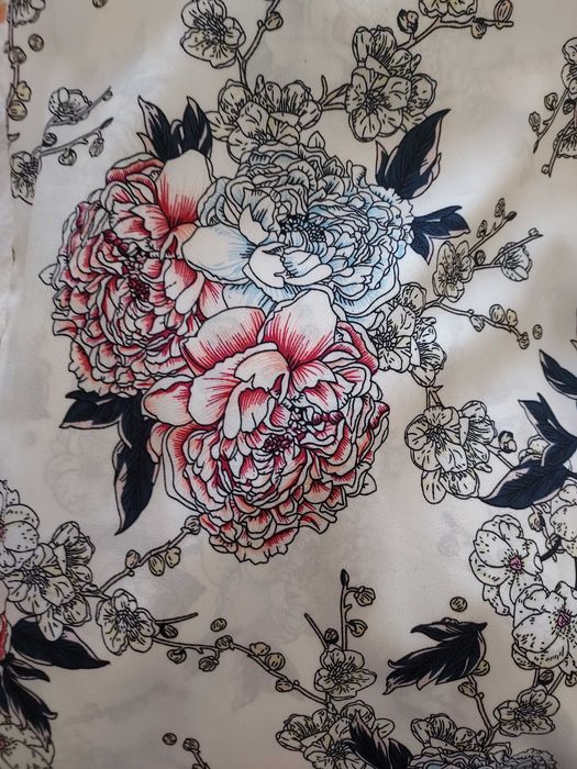 Calças estampadas brancas com bolsos