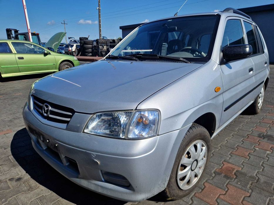 Maska błotnik klapa zderzak Mazda Demio I lift 00-02 części