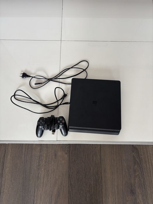 Ps4 slim 500 gb + 8 gier