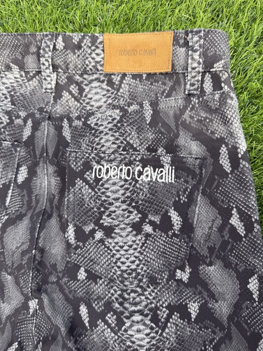 Roberto Cavalli calças flare estampado python