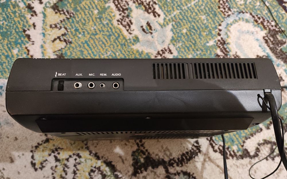 Radio despertador com leitor de cassete