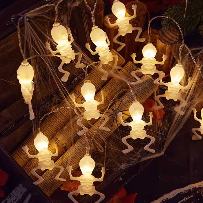 Гірлянда Скелети на Хелловін 1,5 м, 10 LED фігурок скелетів  тепле біле світло, декор на батарейках