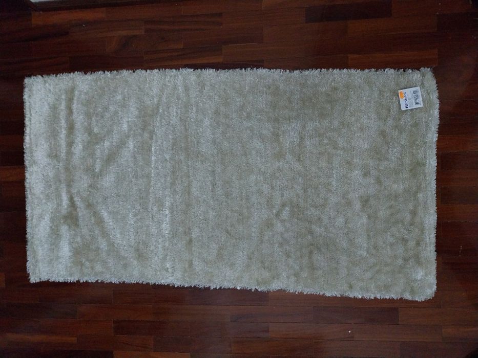Conjunto de tapetes brancos