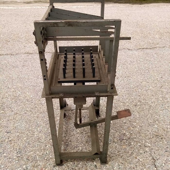 Maquina de extração de tabuleiros