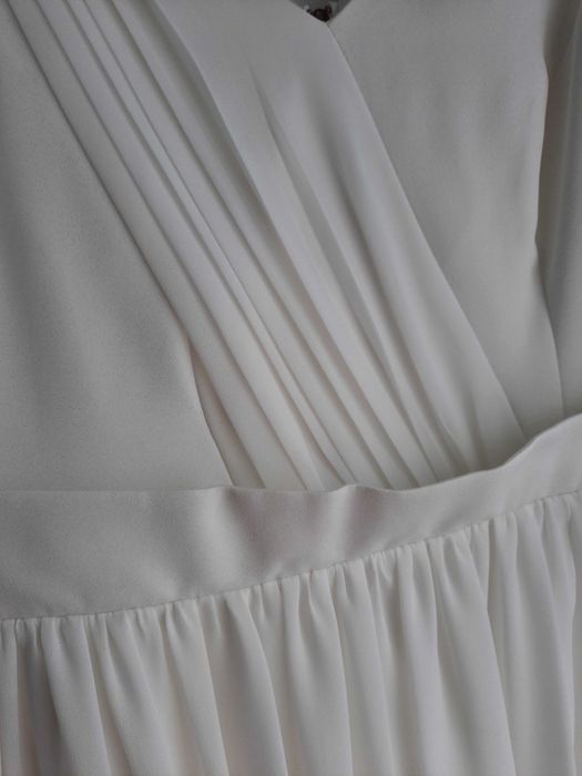 Suknia ślubna w kolorze śmietankowym