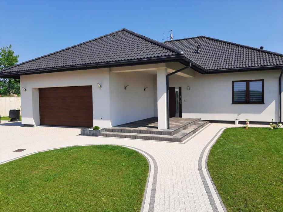 Usługi brukarskie układanie kostki brukowej granit Polbruk ogrodzenia