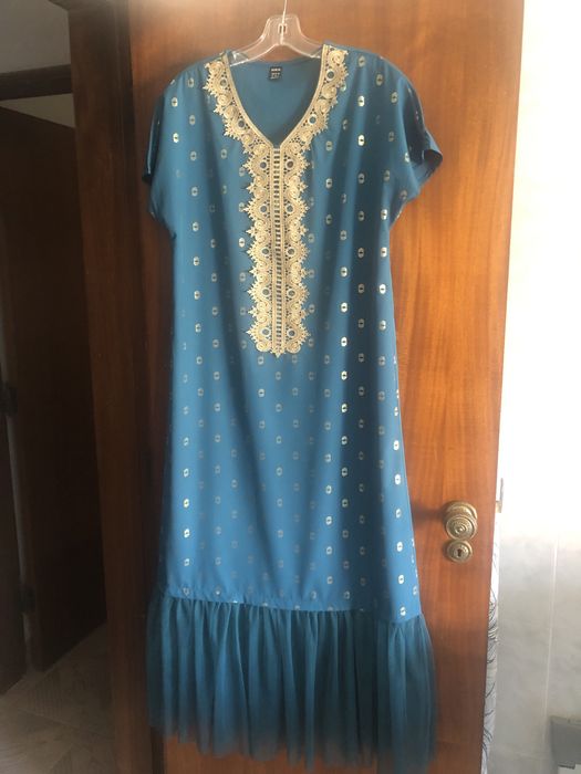 Uma  tunica nova varias pecas , e 1 vestidos novo ver fotos