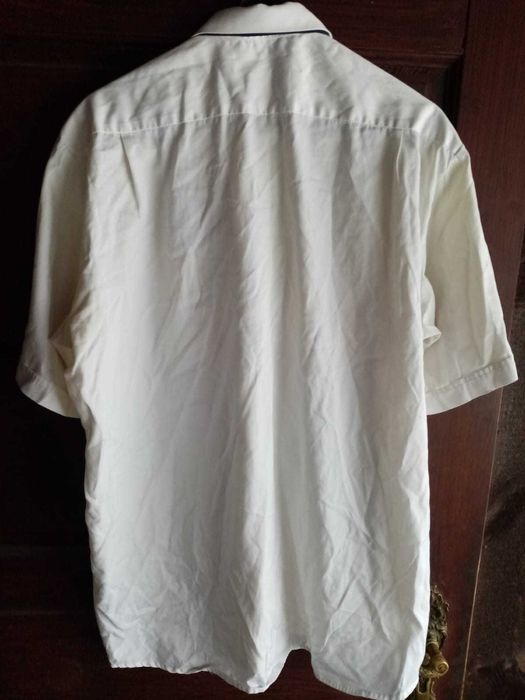 Policja, MO - koszula biała z krawatem i pagonami nadkomisarza.