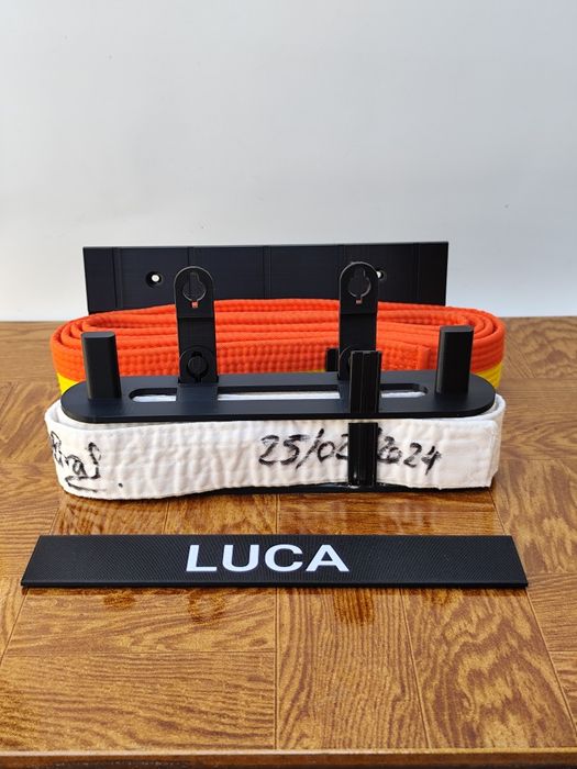 Suporte para cintos de artes marciais