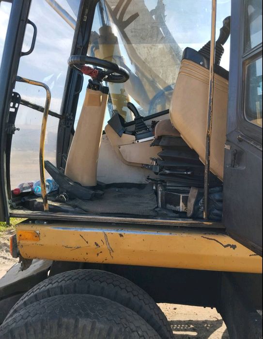 Продам екскаватор CAT