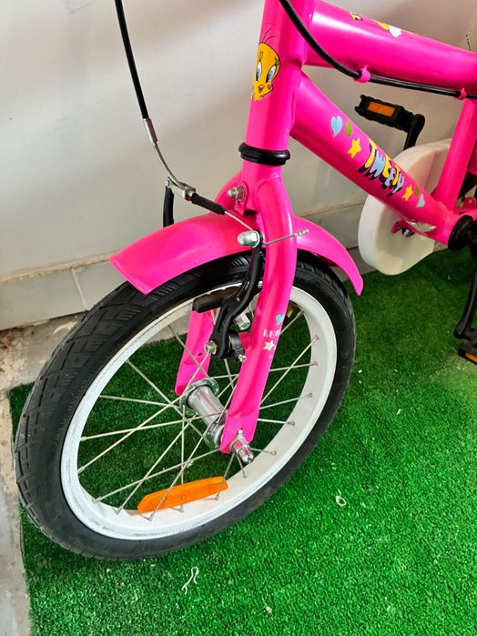 Bicicleta Tweety como nova e capacete