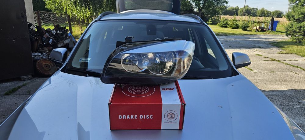 Lampa  lewa przód bmw x1 e84 ( H7 Europa  )