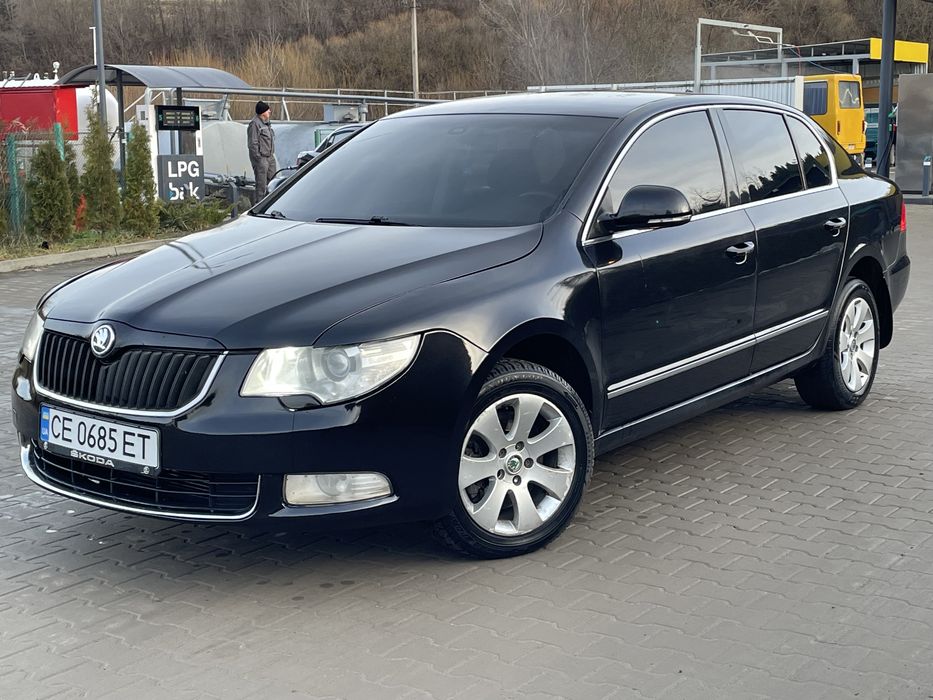 Суперб коробка автомат 2010 рік