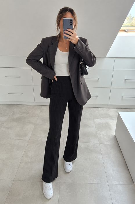 H&M czarne spodnie w prążki M flare wysoki stan.
