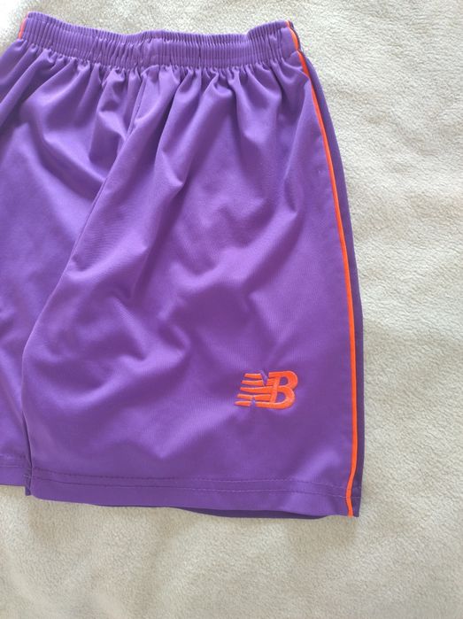 Spodenki sportowe marki New Balance r. 146/152
