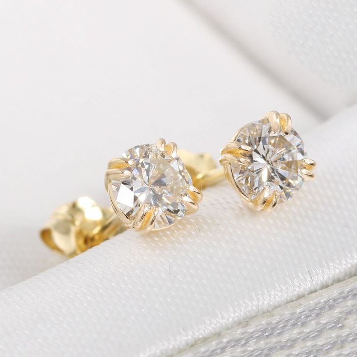 Złote kolczyki z brylantami 0.68ct 14K
