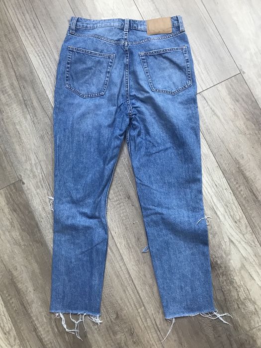 Spodnie jeans z dziurami