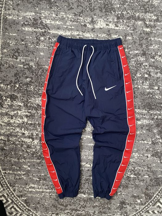 Штани Nike нейлонові PSG paris Л розмір синього кольору на лампасах