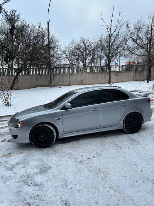Mitsubishi lancer X автомат кожа на газу