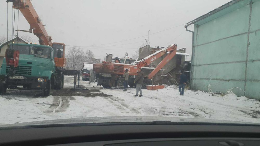 Колісний екскаватор для перевалки Atlas 1804