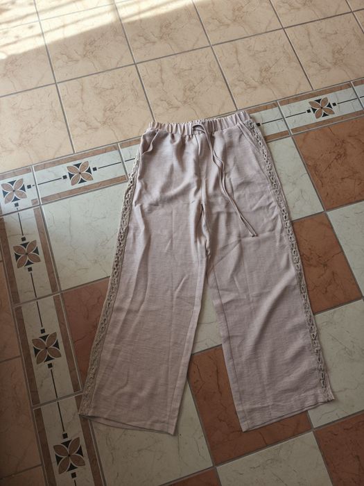 Nowe wiązane piękne materiałowe spodnie brązowe beżowe r.L/xl 40/42